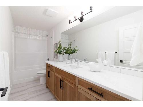 60 Sunvalley View, Cochrane, AB - Indoor Photo Showing Bathroom