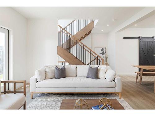 60 Sunvalley View, Cochrane, AB - Indoor Photo Showing Living Room