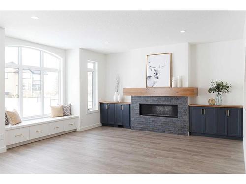 29 Sunvalley View, Cochrane, AB - Indoor Photo Showing Living Room With Fireplace