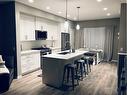 198 Masters Avenue Se, Calgary, AB  - Indoor Photo Showing Kitchen With Upgraded Kitchen 