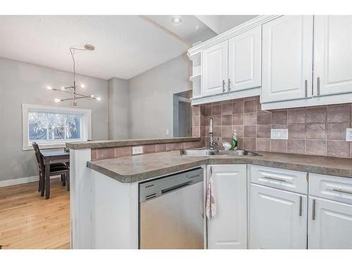 2614 15A Street Sw, Calgary, AB - Indoor Photo Showing Kitchen With Double Sink