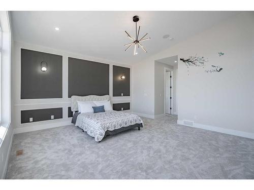 104 Waterstone Park, Chestermere, AB - Indoor Photo Showing Bedroom