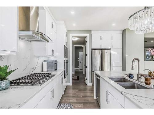 116 Sandpiper Landing, Chestermere, AB - Indoor Photo Showing Kitchen With Double Sink With Upgraded Kitchen