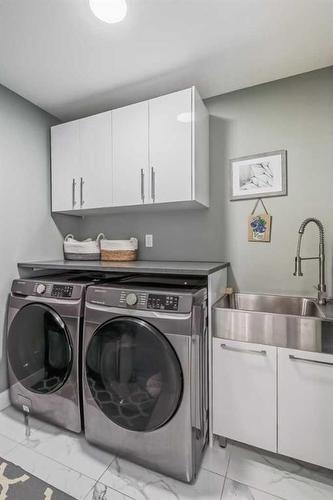 116 Sandpiper Landing, Chestermere, AB - Indoor Photo Showing Laundry Room