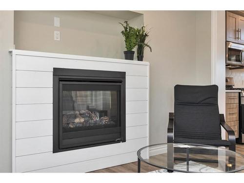 501-454029 Range Road 11, Westerose, AB - Indoor Photo Showing Living Room With Fireplace