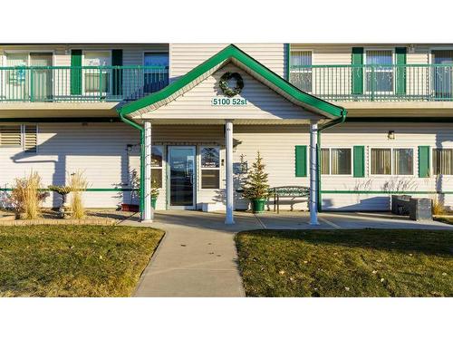 302-5100 52 Street, Olds, AB - Outdoor With Balcony With Deck Patio Veranda