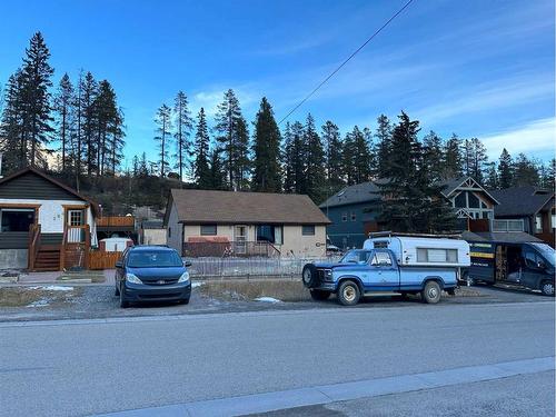 264 Three Sisters Drive, Canmore, AB - Outdoor With Facade