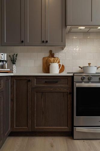 88 Sunrise Heath, Cochrane, AB - Indoor Photo Showing Kitchen