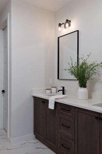 88 Sunrise Heath, Cochrane, AB - Indoor Photo Showing Bathroom