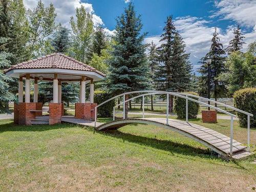 8070 266 Avenue West, Rural Foothills County, AB - Outdoor With Deck Patio Veranda With Backyard