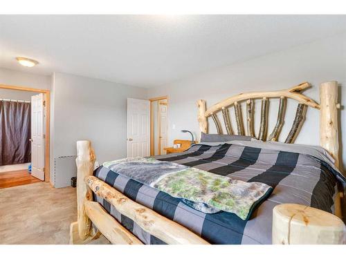 482074 144 Street West, Rural Foothills County, AB - Indoor Photo Showing Bedroom