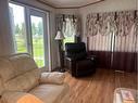 2028-35468 Range Road, Rural Red Deer County, AB  - Indoor Photo Showing Living Room 
