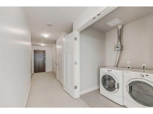 2102-99 Spruce Place Sw, Calgary, AB - Indoor Photo Showing Laundry Room