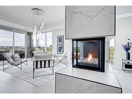 708-1020 9 Avenue Se, Calgary, AB - Indoor Photo Showing Living Room With Fireplace