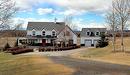 #100, 482003 - 48Th Street East, Rural Foothills County, AB  - Outdoor With Facade 
