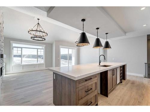 13 Sunvalley View, Cochrane, AB - Indoor Photo Showing Kitchen With Double Sink