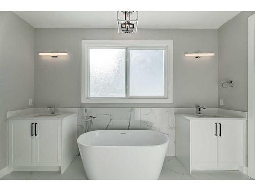 13 Sunvalley View, Cochrane, AB - Indoor Photo Showing Bathroom