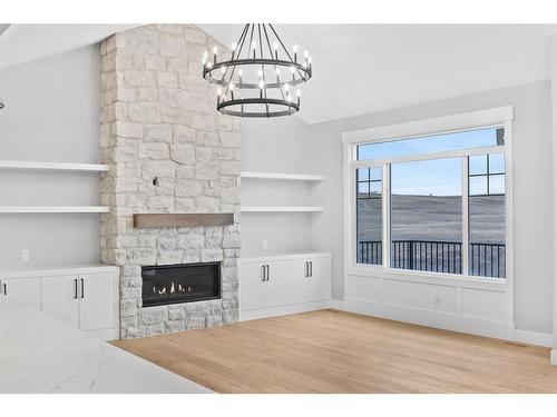 13 Sunvalley View, Cochrane, AB - Indoor With Fireplace