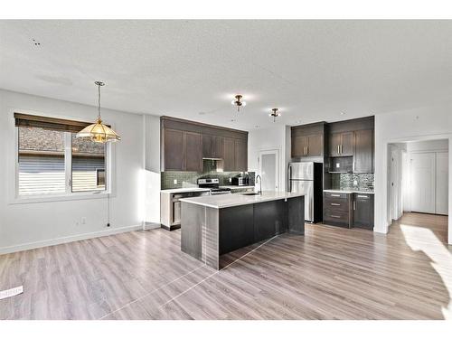 127 Strathmore Lakes Common, Strathmore, AB - Indoor Photo Showing Kitchen With Upgraded Kitchen