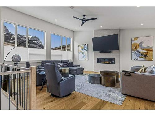 409 Stewart Creek Close, Canmore, AB - Indoor Photo Showing Living Room With Fireplace