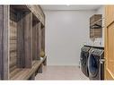 409 Stewart Creek Close, Canmore, AB  - Indoor Photo Showing Laundry Room 
