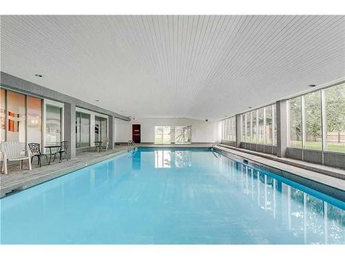 913-4944 Dalton Drive Nw, Calgary, AB - Indoor Photo Showing Other Room With In Ground Pool