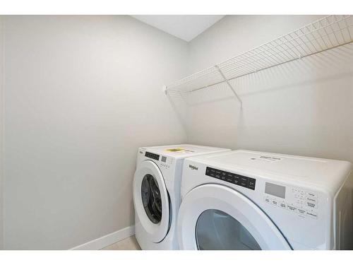 332 Calhoun Common Ne, Calgary, AB - Indoor Photo Showing Laundry Room