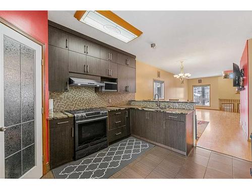 622 Saddlecreek Way Ne, Calgary, AB - Indoor Photo Showing Kitchen With Upgraded Kitchen