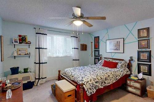 313 54 Avenue East, Claresholm, AB - Indoor Photo Showing Bedroom