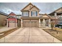 34 Windcreek Terrace Sw, Airdrie, AB  - Outdoor With Facade 