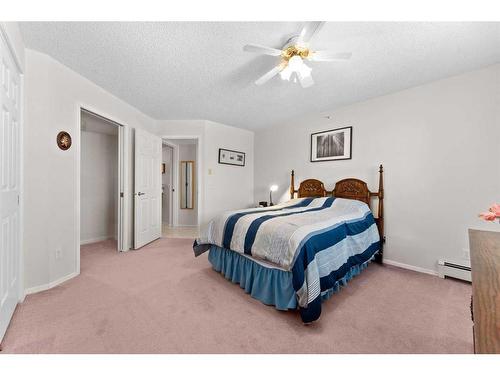 3415-3000 Hawksbrow Point Nw, Calgary, AB - Indoor Photo Showing Bedroom