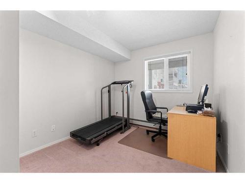 3415-3000 Hawksbrow Point Nw, Calgary, AB - Indoor Photo Showing Gym Room