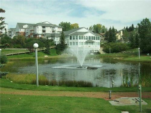 3415-3000 Hawksbrow Point Nw, Calgary, AB - Outdoor With Body Of Water