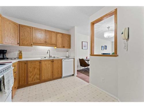 3415-3000 Hawksbrow Point Nw, Calgary, AB - Indoor Photo Showing Kitchen