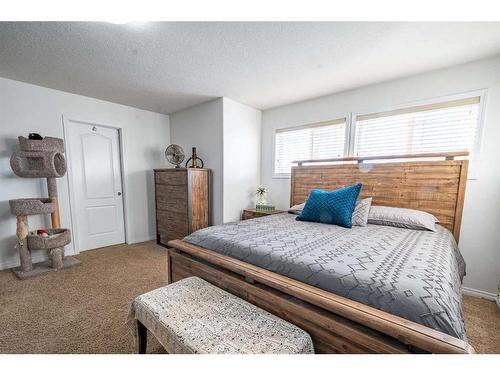 15 Ralston Place, Sylvan Lake, AB - Indoor Photo Showing Bedroom