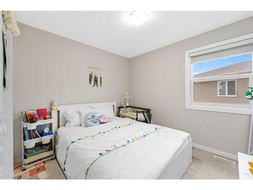 265 Sandpiper Crescent, Chestermere, AB - Indoor Photo Showing Bedroom