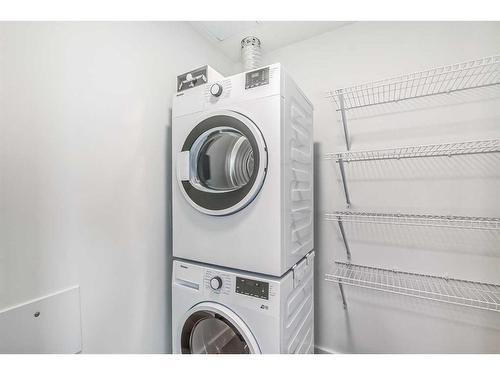 1312-123 4 Street Ne, Calgary, AB - Indoor Photo Showing Laundry Room