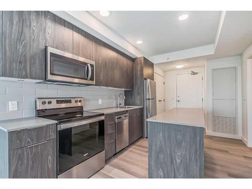 1312-123 4 Street Ne, Calgary, AB - Indoor Photo Showing Kitchen With Stainless Steel Kitchen
