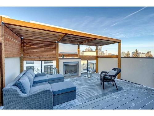 824 Durham Avenue Sw, Calgary, AB - Outdoor With Fireplace With Deck Patio Veranda With Exterior