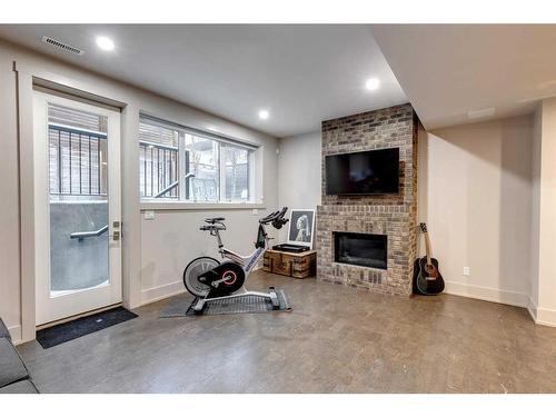 824 Durham Avenue Sw, Calgary, AB - Indoor With Fireplace