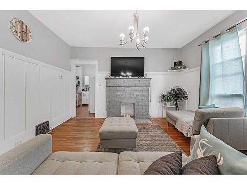 2117 17A Street Sw, Calgary, AB - Indoor Photo Showing Living Room With Fireplace