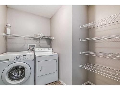 29 Saddlecrest Green Ne, Calgary, AB - Indoor Photo Showing Laundry Room