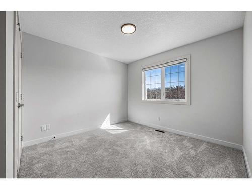 110 Aspen Stone Grove Sw, Calgary, AB - Indoor Photo Showing Other Room