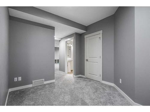 110 Aspen Stone Grove Sw, Calgary, AB - Indoor Photo Showing Other Room