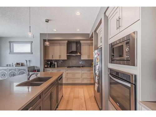132 Marquis View Se, Calgary, AB - Indoor Photo Showing Kitchen With Double Sink