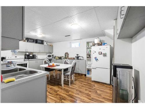 9110 34 Avenue Se, Calgary, AB - Indoor Photo Showing Kitchen With Double Sink
