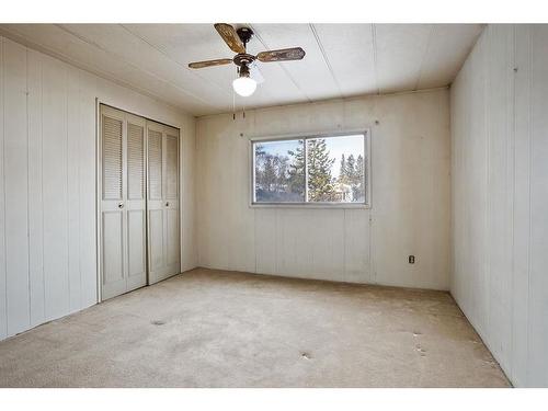 209 Sunset Boulevard Sw, Diamond Valley, AB - Indoor Photo Showing Other Room