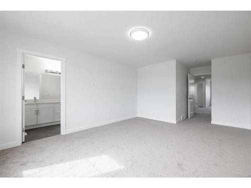 164 Sunrise Common, Cochrane, AB - Indoor Photo Showing Other Room
