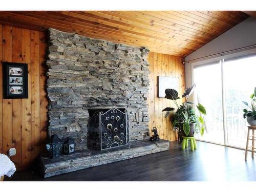 10-2168 Hwy 587, Rural Red Deer County, AB - Indoor With Fireplace