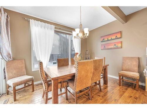 8 Sunset View, Cochrane, AB - Indoor Photo Showing Dining Room